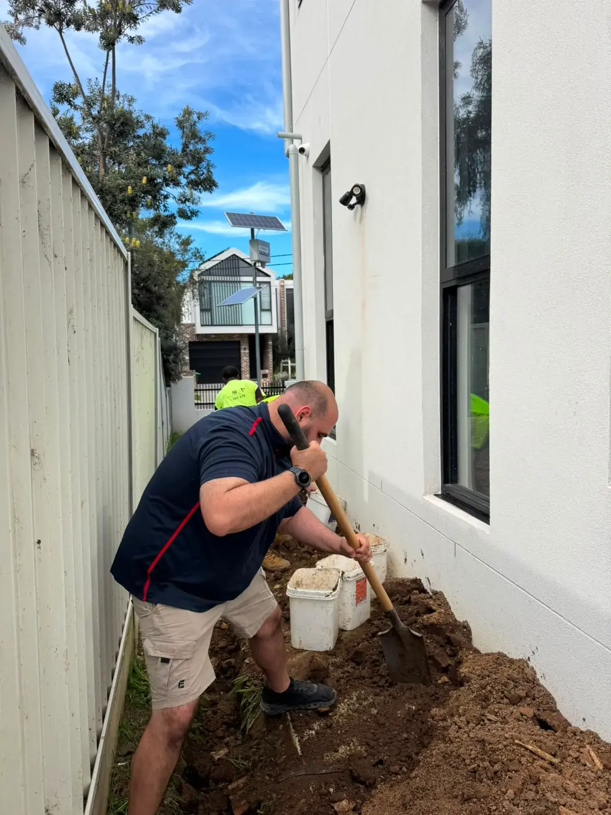 Ryde plumber from Antons excavating beside a residential property
